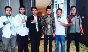 Anggota Tenaga Ahli Pemberdayaan Masyarakat Desa (TA. PMD) Kabupaten Indramayu Yana Sudiana Berjas Hitam