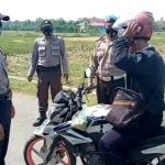 Polsek Cantigi Laksanakan Operasi Yustisi & Bagikan Masker